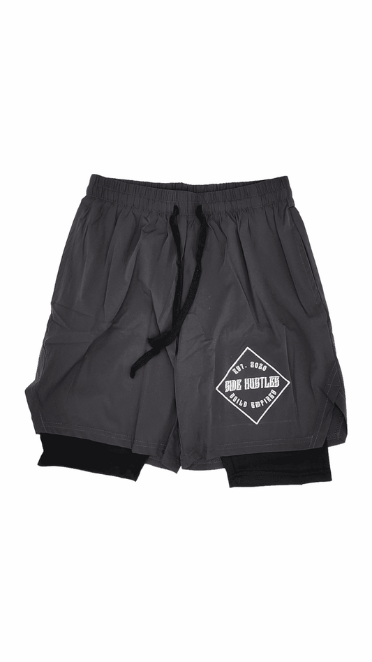2 in 1 Compression Shorts, grey nylon, and compression shorts with an embroidered logo for active individuals with side hustles. comfortable  and stylish hustle apparel.